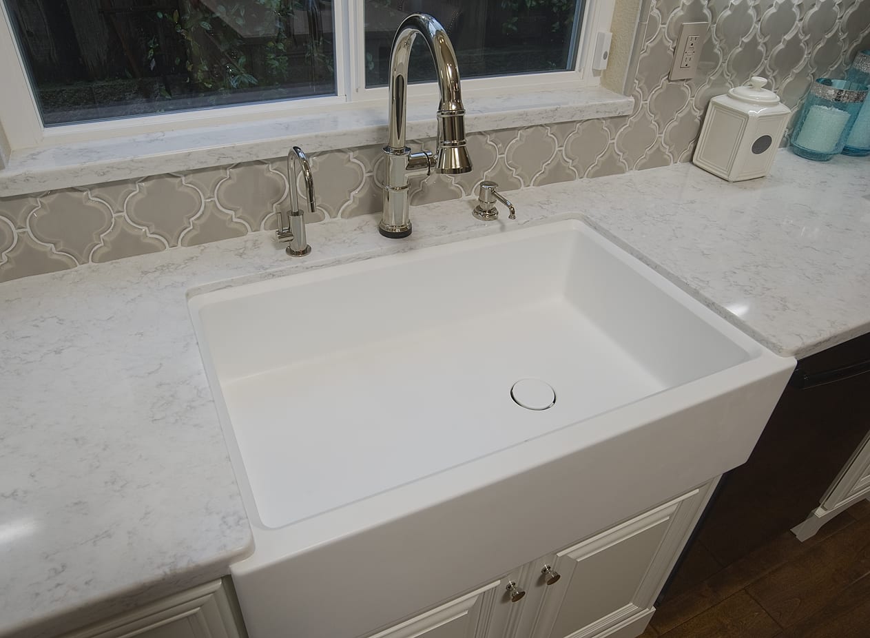Photo of solid surface kitchen sink and countertop