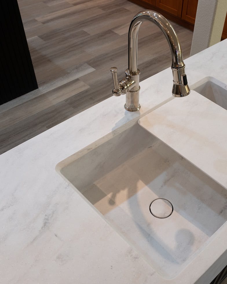 Photo of kitchen sink with Signature Surfaces basin and countertop