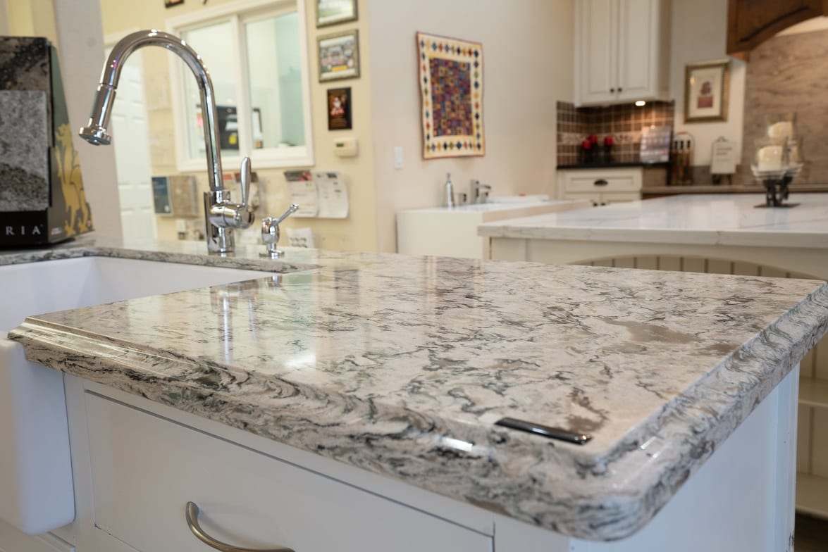 Photo of Signature Surfaces kitchen countertop next to sink