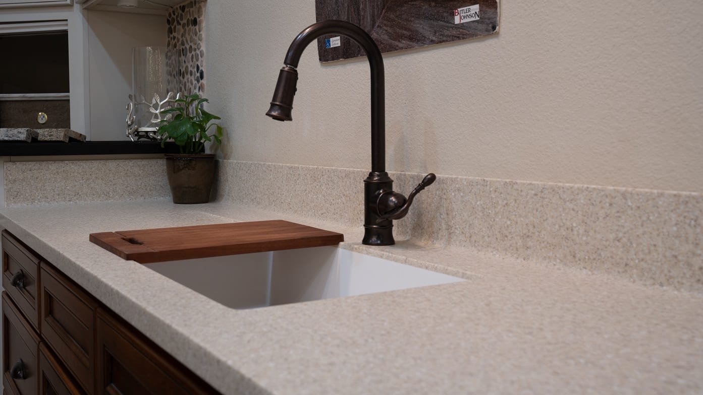 Photo of kitchen sink with Signature Surfaces countertop