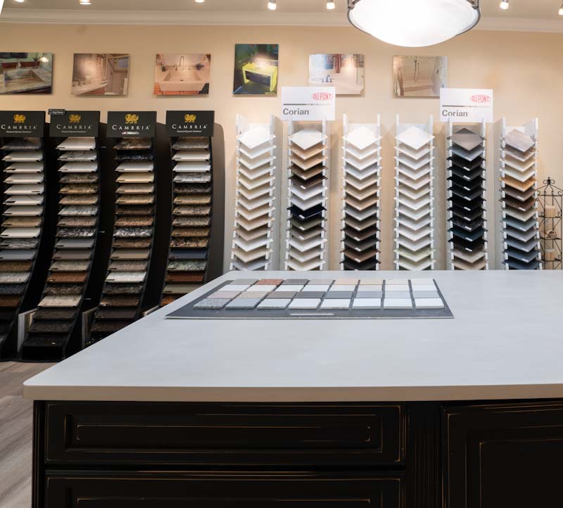 Photo of kitchen with quartz and solid surface countertops